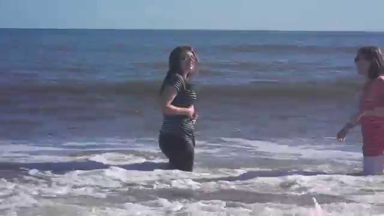 Amy and I jump into the waves at the beach a second time