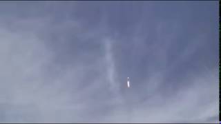 Supersonic shockwaves visible as rocket passes through clouds composed of ice crystals