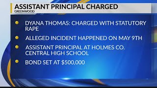 Holmes Asst. Principal charged