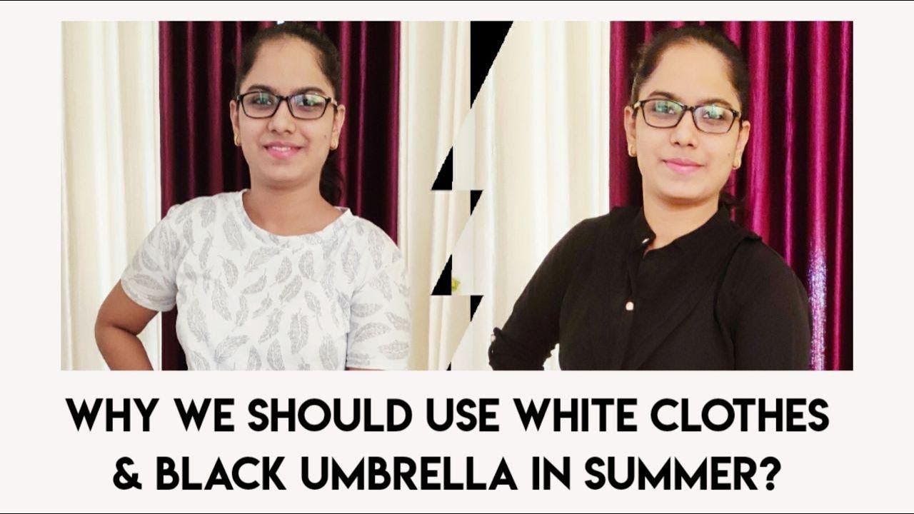 Why should we wear light color clothing and black color umbrella in hot