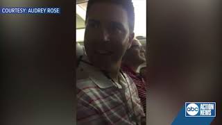 Woman surprises husband with pregnancy announcement on flight from Tampa