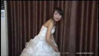 Pretty asian bride in wedding dress head shaved to bald in hotel