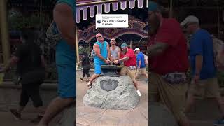 BIG STRONG MEN PULL THE SWORD IN THE STONE AT DISNEY WORLD