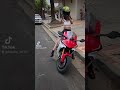 TikTok girl riding YAMAHA R1 in shorts.