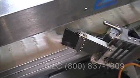 QLC using Label-Aire 6000 and model 3115NV for side apply