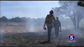 ODF firefighters practicing communication at live burn training