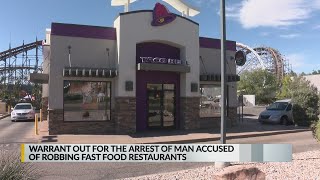 Warrant out for arrest of man accused of robbing fast food restaurants