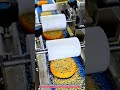 Hamburger Bun Sesame Coating Machine Sprays Oil and Applies 98% Seed Coverage at 120 Buns/Min