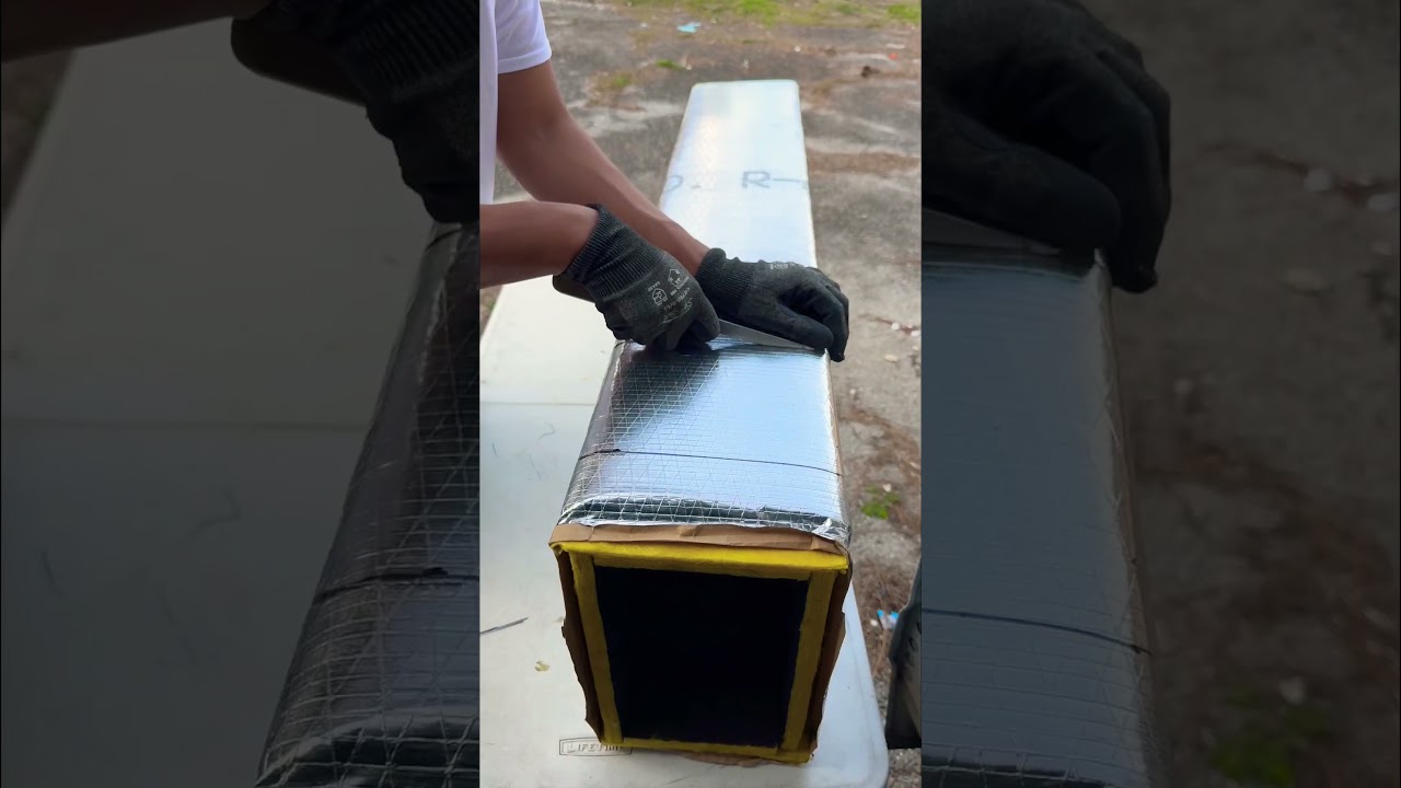 Cutting fiberglass duct offset #hvac #construction #work #worklife #airconditioning #insulation