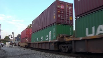 NS 8036 (GE ES44AC) leads  NS 23G