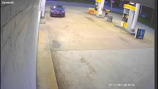 Video shows man trying to light fire at gas station
