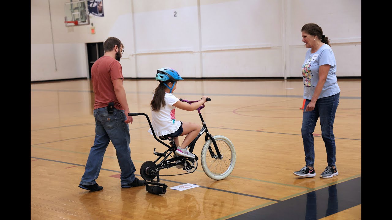 Capper Foundation's iCan Bike Program teaches individuals to ride - YouTube