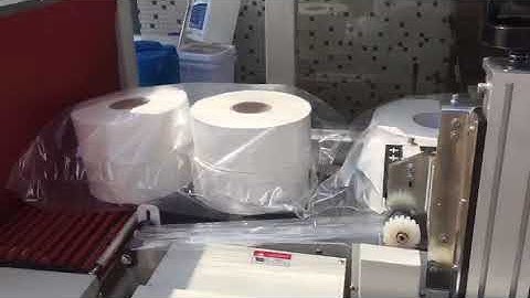 Automatic maxi roll paper shrink wrapping machine