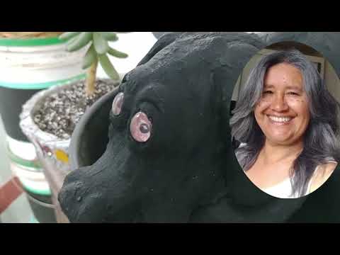 CACHORRO DE CIMENTO FEITO NO MOLDE DE AREIA