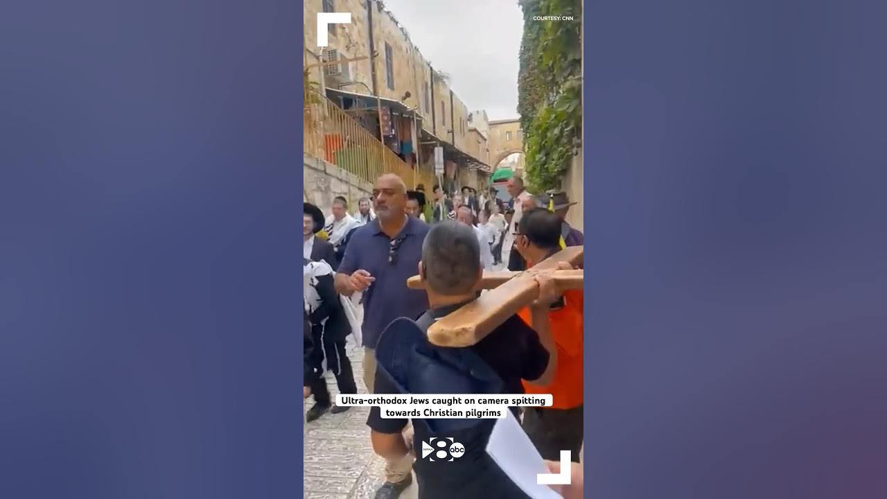 Ultra-orthodox Jews spit towards Christian pilgrims leaving Church of the Flagellation