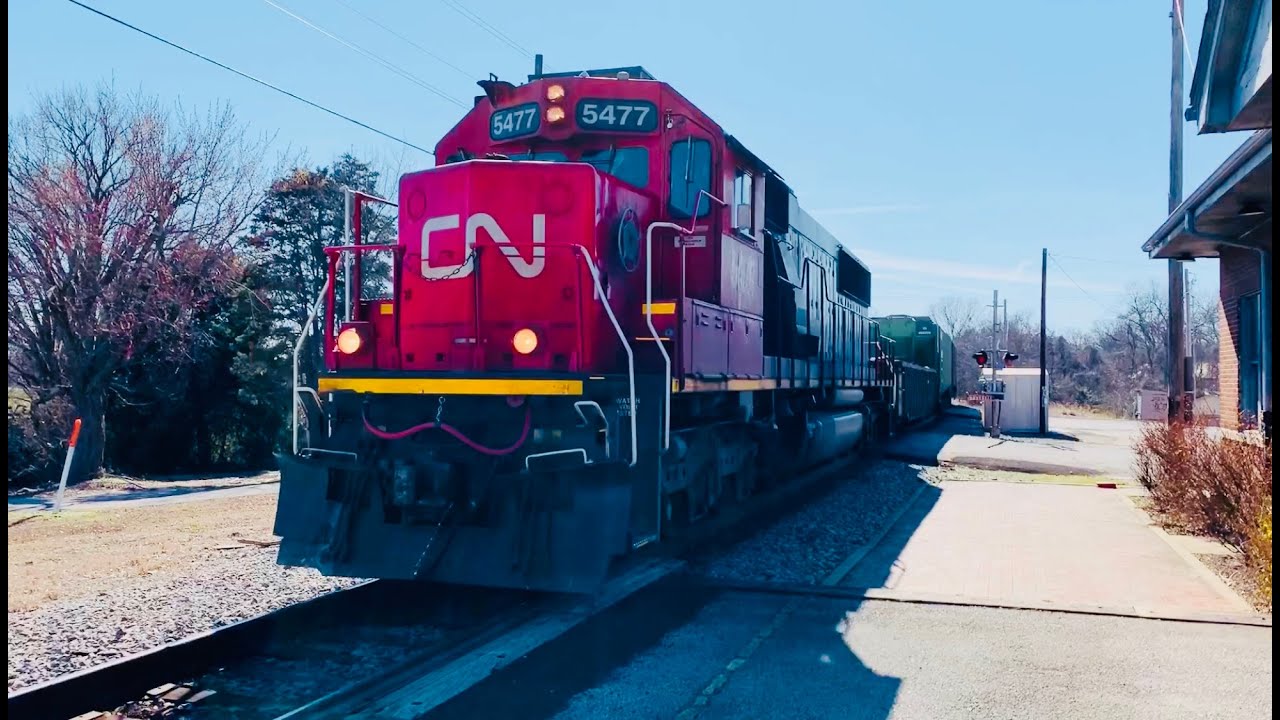 Solo CN 5477 SD60 Standard Cab w/ Nice P3 leads a long local.
