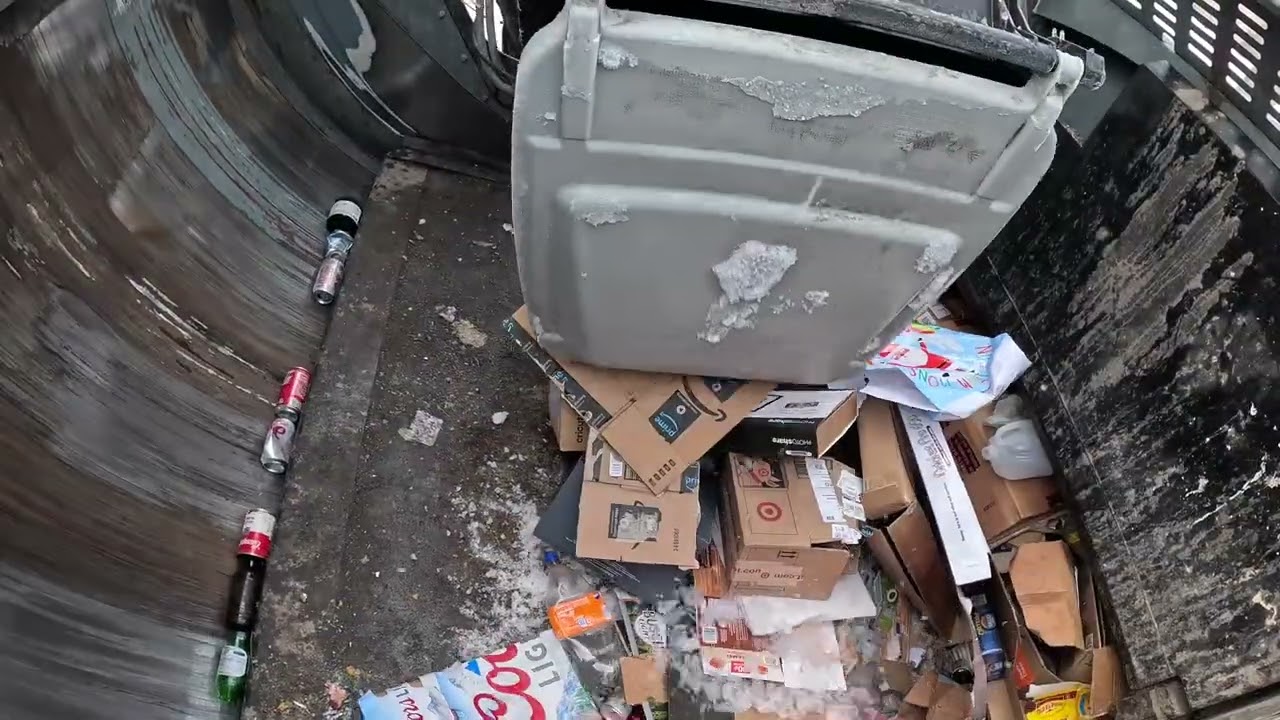 Garbage truck hopper POV: Recycling collection Pete McNeilus ZR