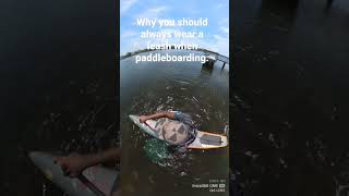 Paddleboarding a cross current of two rivers. Why you need to always wear a leash.