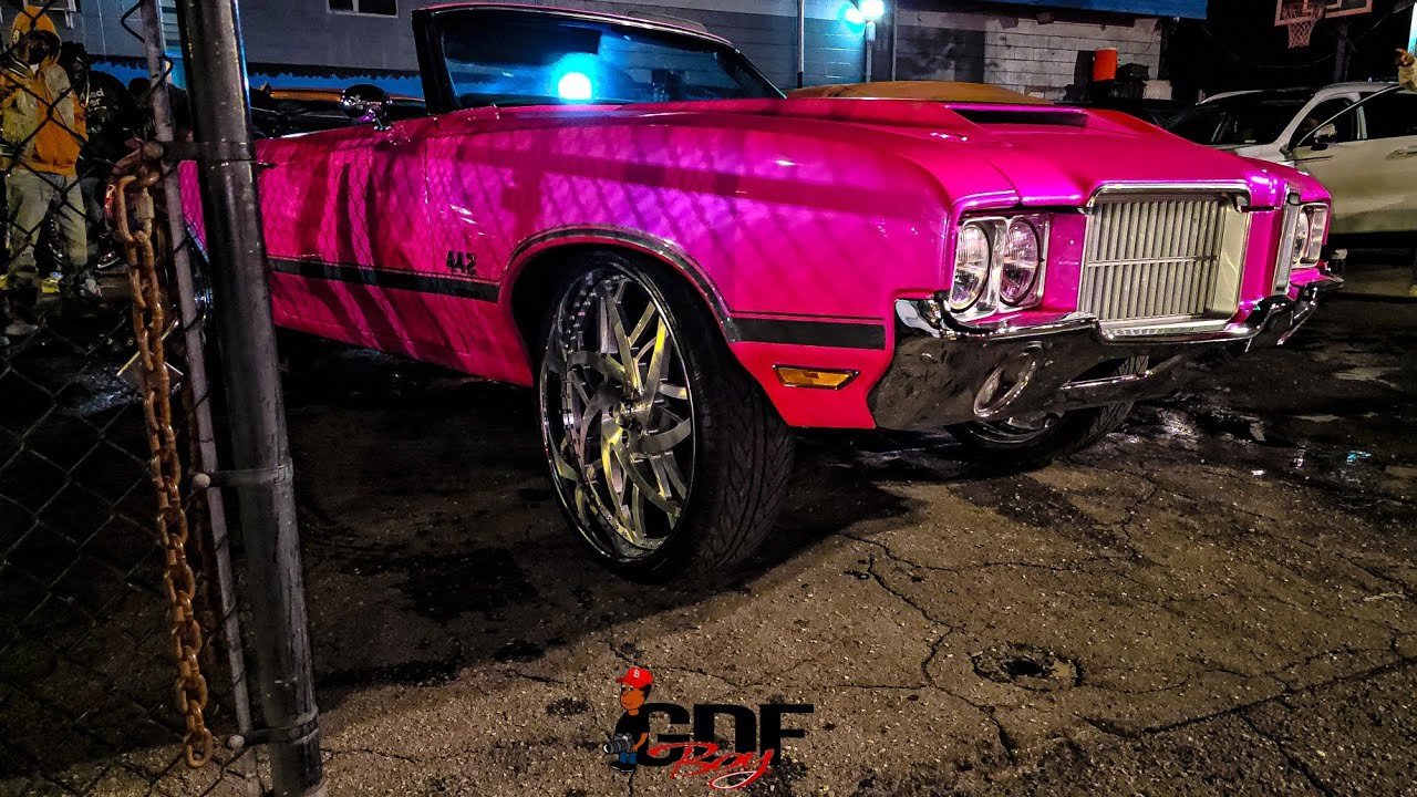 Outrageous Pink Oldsmobile Cutlass 442 Convertible on Brushed Face Asanti 26s.