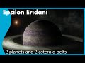 Epsilon eridani 2 planets and 2 asteroid belts
