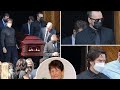 Mark and Donnie Wahlberg carry their late mom Alma’s casket during her funeral church service in Bos