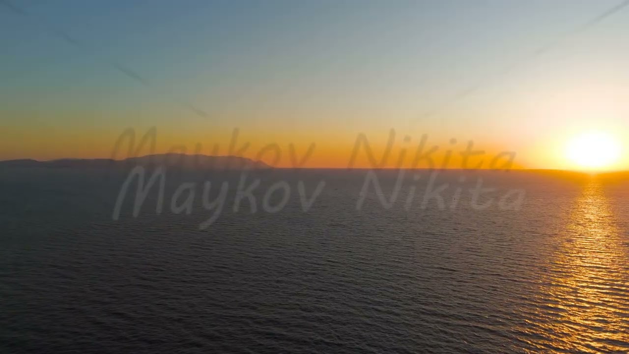 Kusadasi, Turkey. Aerial panoramic view of the coastline during sunset. Golden hour shot capturin...