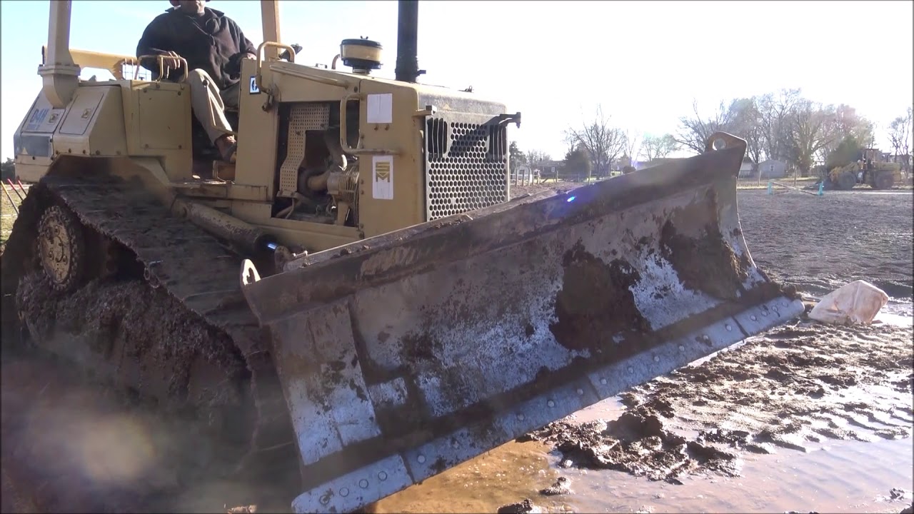Working in some mud with Caterpillar D4H YouTube