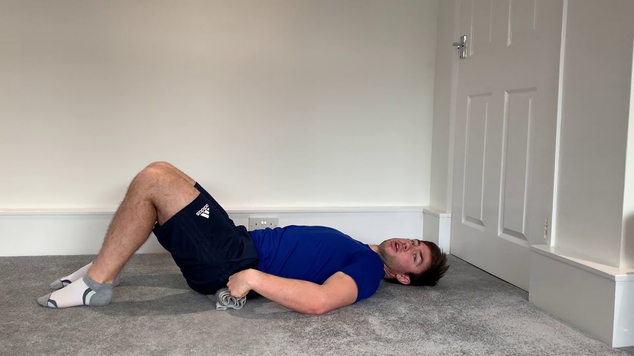 Pelvic Tilting in Crook Lying Exercise - YouTube
