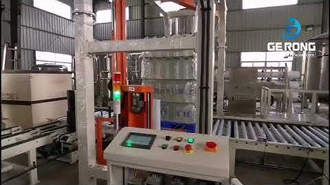 Water bottle pallet shipping cargo stretch film wrapping sealing packing machine running video