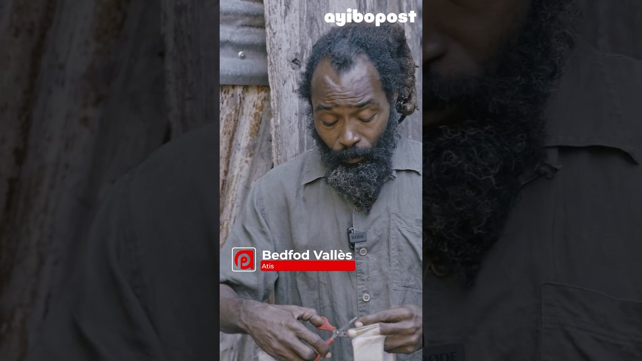 Yon atis plastisyen sèvi ak fatra pou l sove Pòtoprens