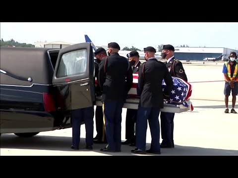 Slain Army Sgt. 1st Class John Jean’s closed casket arrives at Fort Lauderdale airport