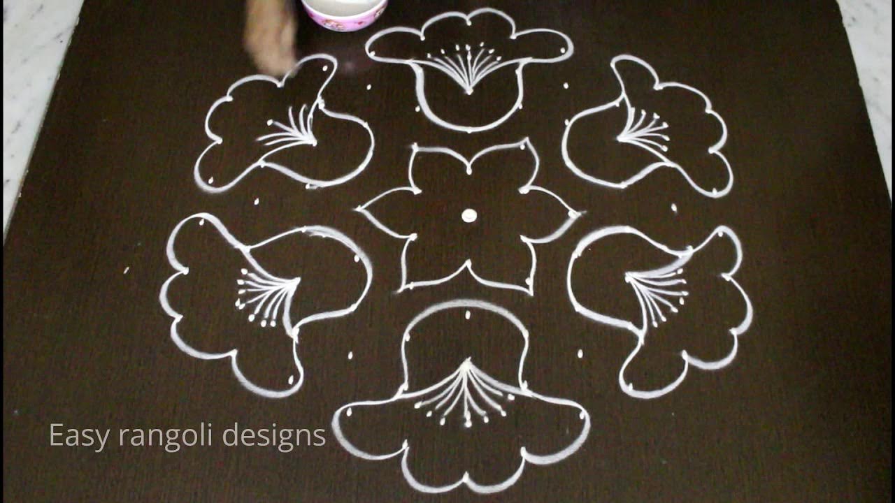 simple kolam designs with 11 dots * beautiful flower muggulu ...