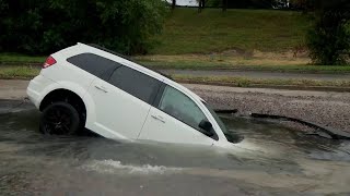 Woman safe after sinkhole rescue; what's next for roadway