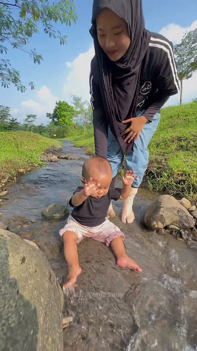 POV of a 9-MONTH-OLD BABY BATHING IN THE RIVER FOR THE FIRST TIME