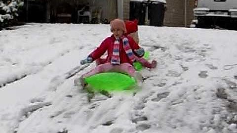 More Sledding on the Pool Raft
