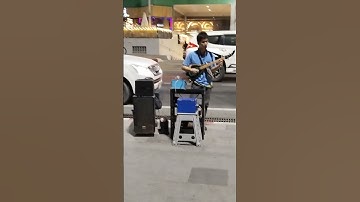 In Pattaya Blind man shows off his guitar skill