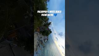 Pagudpud’s White Beach from the sky — endless blue perfection 🏖️💙
