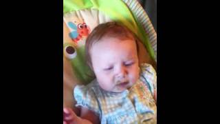 Baby eats peas