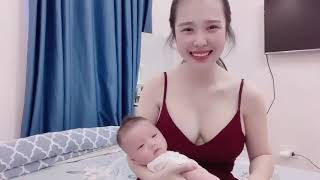 32 nhung xinh 8899 ,Gái một con xinh đẹp cho con bú