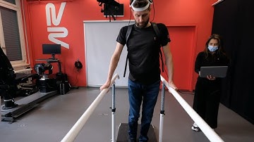 Paralyzed man walks again with help of 