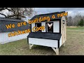 The chickens get a new home. Building a chicken coop with plans.
