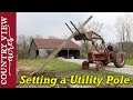 Setting a Utility Pole with a Tractor