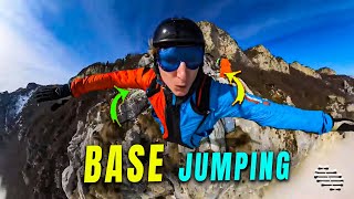 Guy Base Jumping from a Mountain into the Clouds