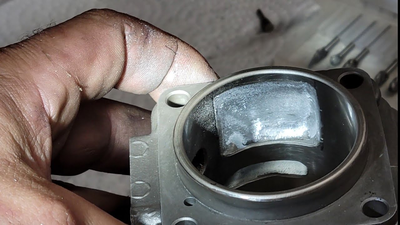 Husqvarna 268xp giveaway saw. Porting the cylinder!!