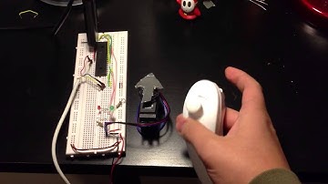 Wii nunchuck interfaced with dsPIC40F4011 controlling a servo motor
