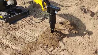 Auger attachment- perfect for drilling, digging, small excavations or construction purposes.