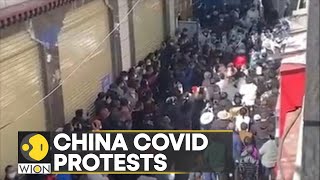 China COVID protests: People break COVID barriers in Haizhu district | World English News | WION