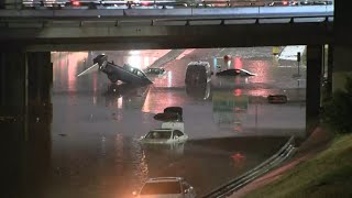 Dallas, Texas flooding: Abandoned vehicles on I-30 after flash flood