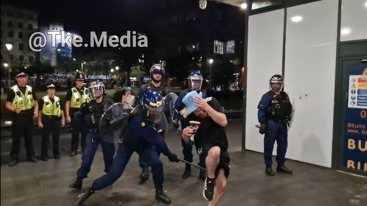 Chaos erupts at Man City fan impromptu street celebrations. In Manchester. Following treble win