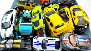 Box full of Mini EV, Supra, Jeep, DHL, Rolls-Royce, Lexus LM300h, Bugatti, Police car, Mc Laren, Kia